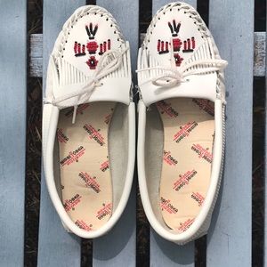 White Minnetonka Moccasins.